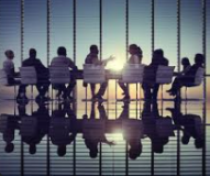 Business: Professional workspace with people at a meeting