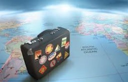 Travel: Suitcase on a globe